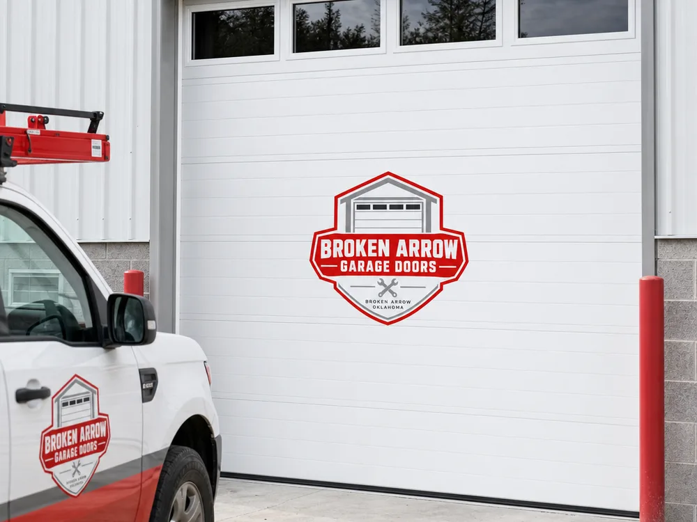 Finished insulated sectional overhead door on a light industrial building with clean perimeter sealing